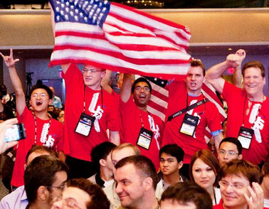 ASU’s Team Note-Taker (standing, with flag) took the second-place overall prize in the world’s leading student technology competition in New York City for their device to aid students with visual impairments. Left to right are team members Qian Li, David Hayden, Shashank Srinivas and Michael Astrauskas, with team mentor John Black. Photo courtesy of Microsoft.
