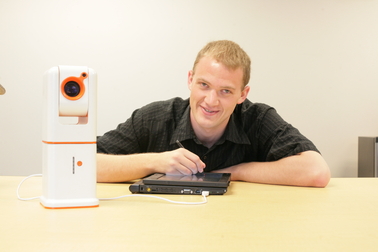 Recent ASU graduate David Hayden is pictured using a version of the Note-Taker, a prototype of a device he invented to aid students with visual impairments. He’s continuing to improve the technology with the help of three current ASU students.