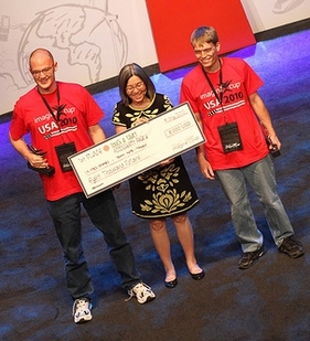 ASU computer science students David Hayden (left) and Andrew Kelley (right) are awarded a top prize at the Microscoft Imagine Cup Worldwide Finals. They represented a team of ASU student researchers who developed a devise to aid people with visual impairments.
