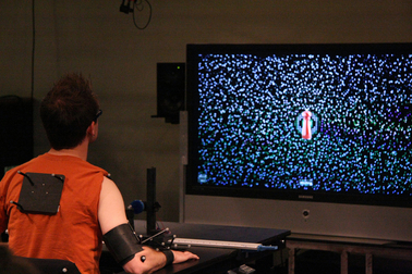 Artists and engineers are working together in the ASU School of Arts, Media + Engineering to develop a biofeedback system that aids rehabilitation for stroke patients. Photo by: Jessica Slater