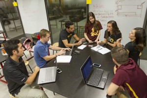 EPICS team Engineering Smiles during a brainstorming session. Photographer: Jessica Hochreiter/ASU.