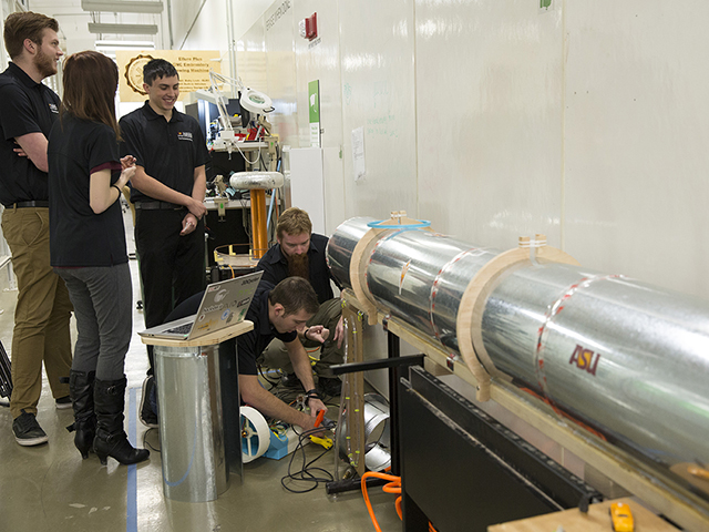 Members of the Hyperloop Team prepare for a test run of their Hyperloop Pod prototype.