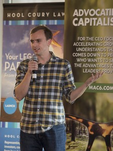 Brandon Garrett, aerospace engineering student and co-founder of Tech Dispatcher, speaks about his startup at the Collegiate Venture Competition at the Arizona State University Innovation Center at Skysong, April 8, 2016. Tech Dispatcher competed against ten other student startups from universities across the state for $60,000 in prizes and a Draper University scholarship. Photographer: Hayden Taylor/ASU