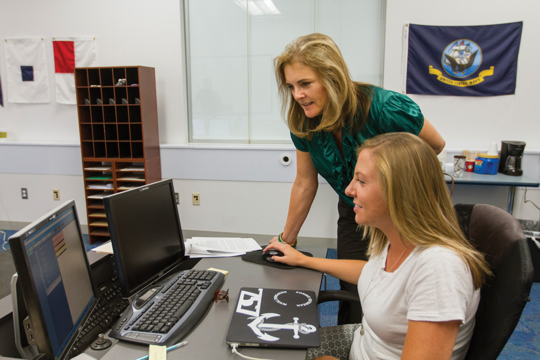 Nancy Cooke, standing, with graduate student Jessica Twyford.