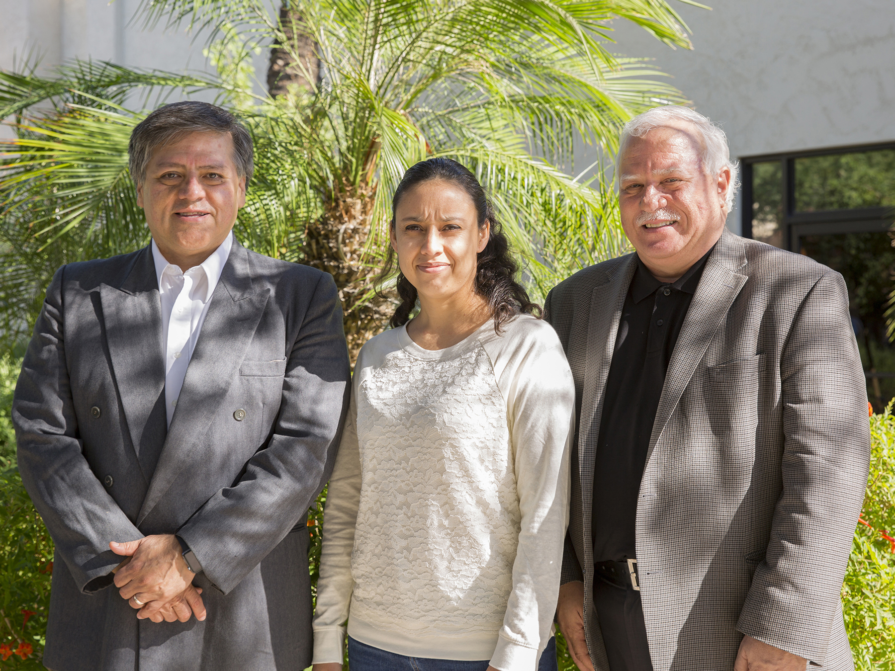 Andreas Spanias (right), professor of electrical engineering and director of the Sensor, Signal and Information Processing Center, welcomes SENS MACH speakers Jose Vargas, Director of the Center for Electronics and Telecommunications (left) and Rafaela Villalpando Hernandez, both from ITESM.