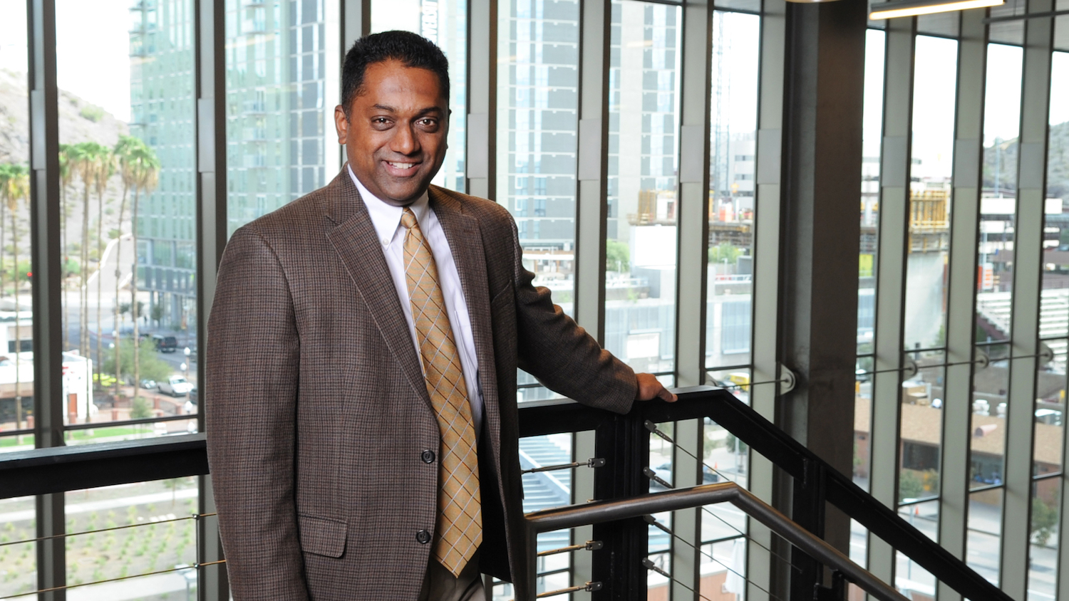 Portrait of Samuel Ariaratnam. Caption says: Samuel Ariaratnam, a construction engineering professor and program chair, was appointed for a 16-month term to serve on national committee studying the safety of the nation’s propane pipeline systems. Photographer: Tim Trumble