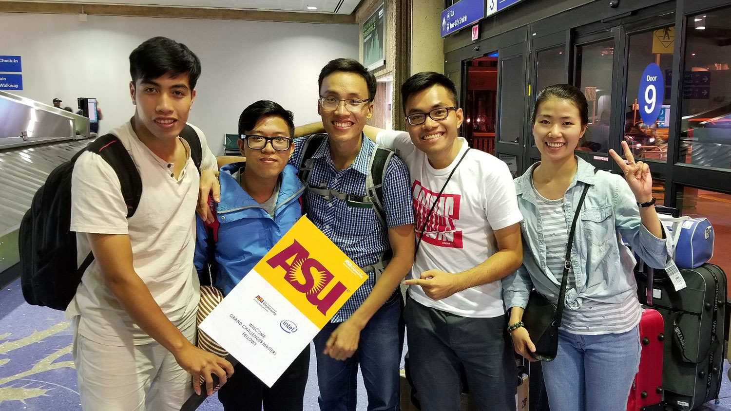 Photo of five of six Vietnamese scholars arriving at Phoenix Sky Harbor International Airport ahead of their one-year master's fellowship at Arizona State University.