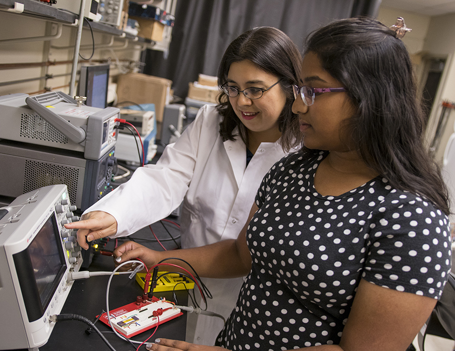 two people looking at monitor
