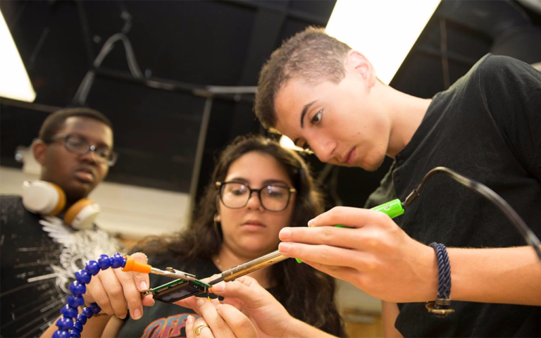 students using tools together