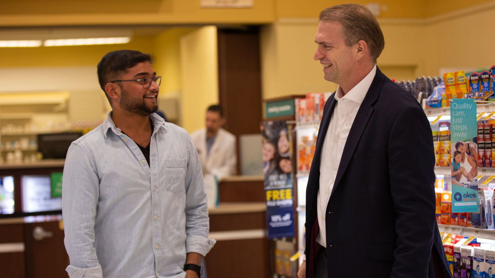 Photo of two men standing
