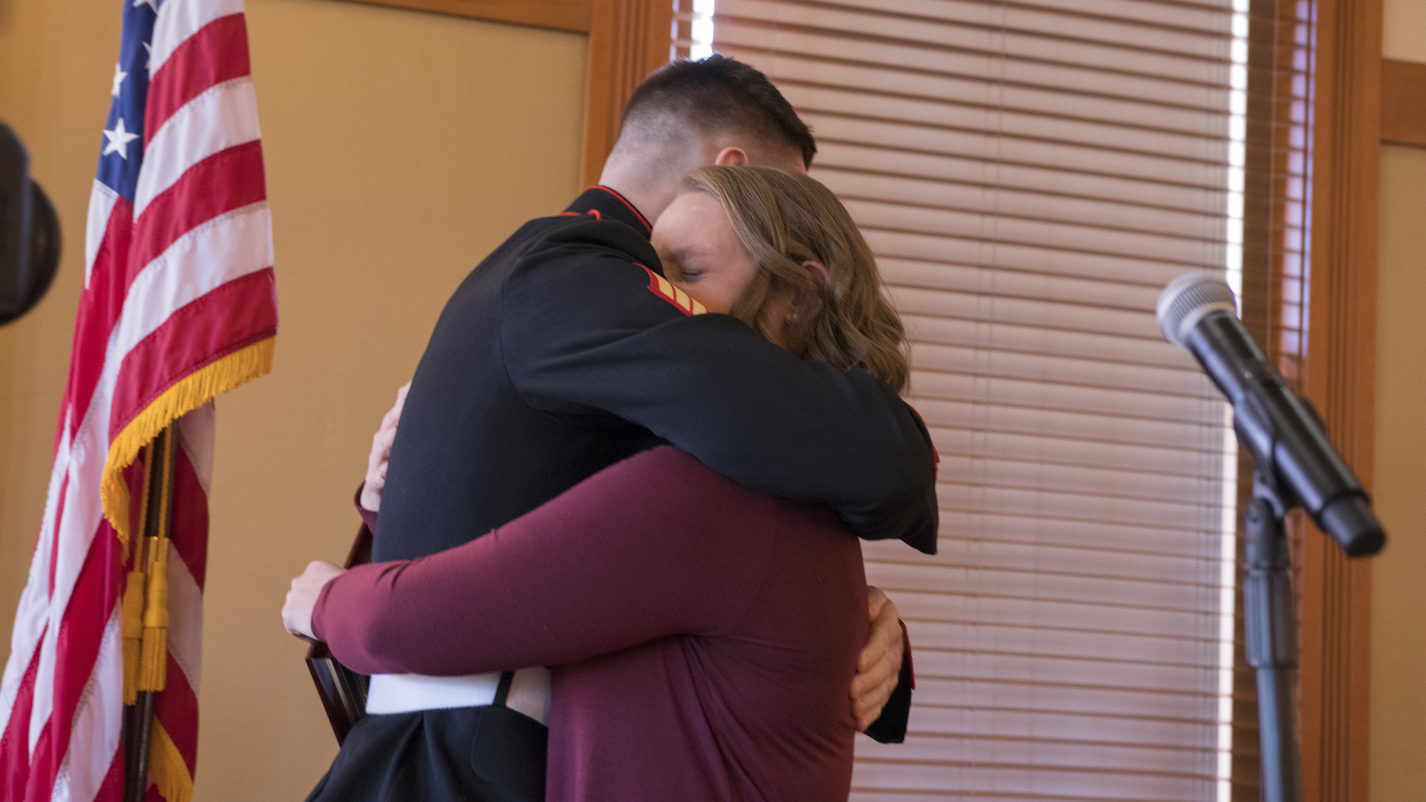 Two siblings hugging