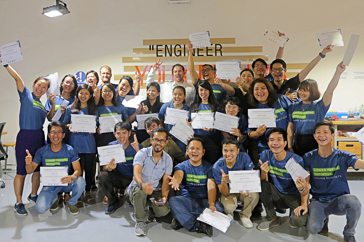 large group of students holding certificates