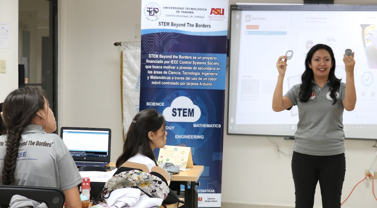 Victoria Serrano teaching in front of a class