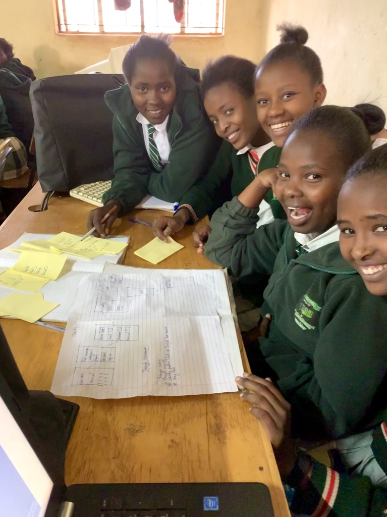 students sitting at a table
