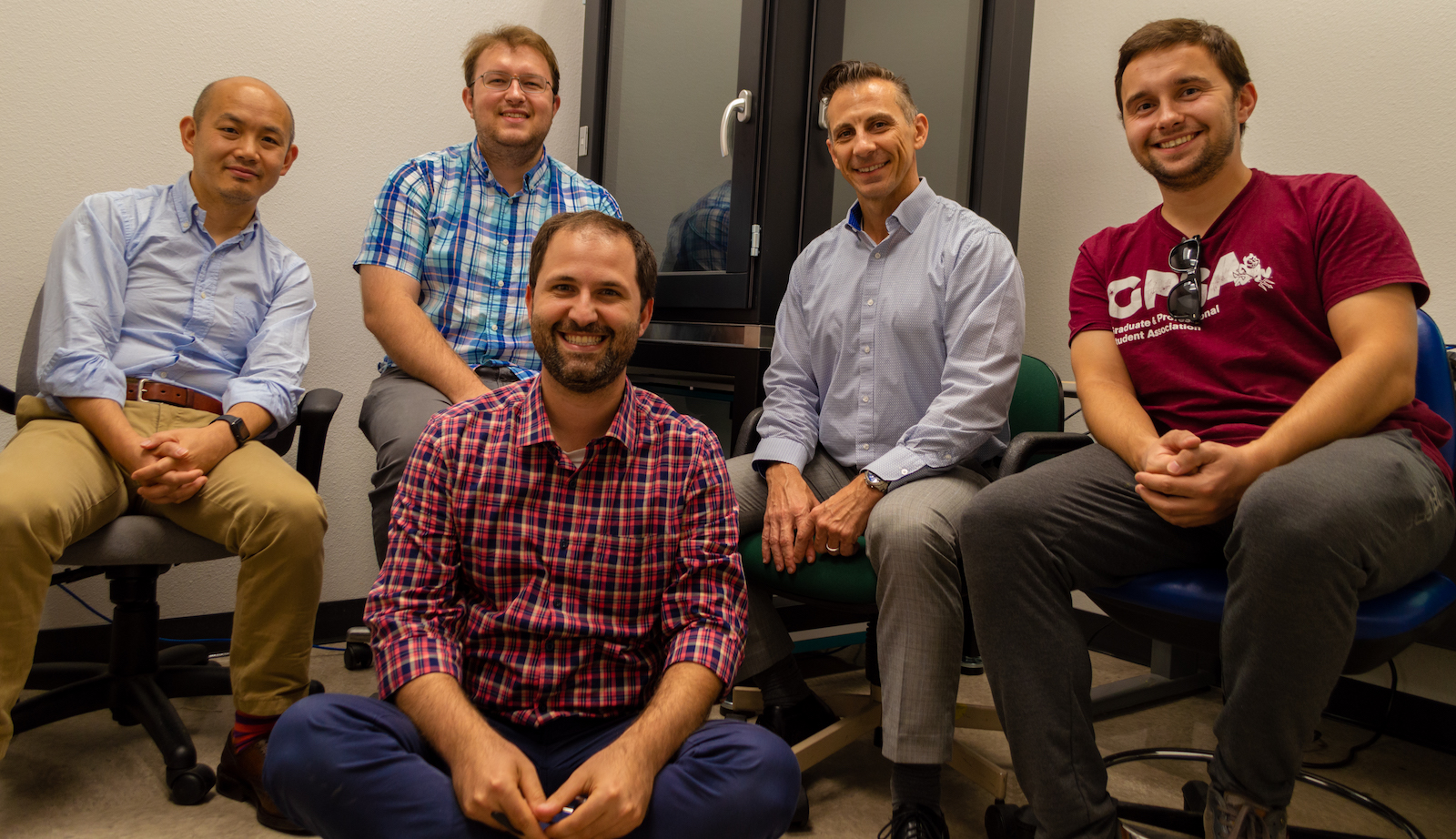 Five people sitting