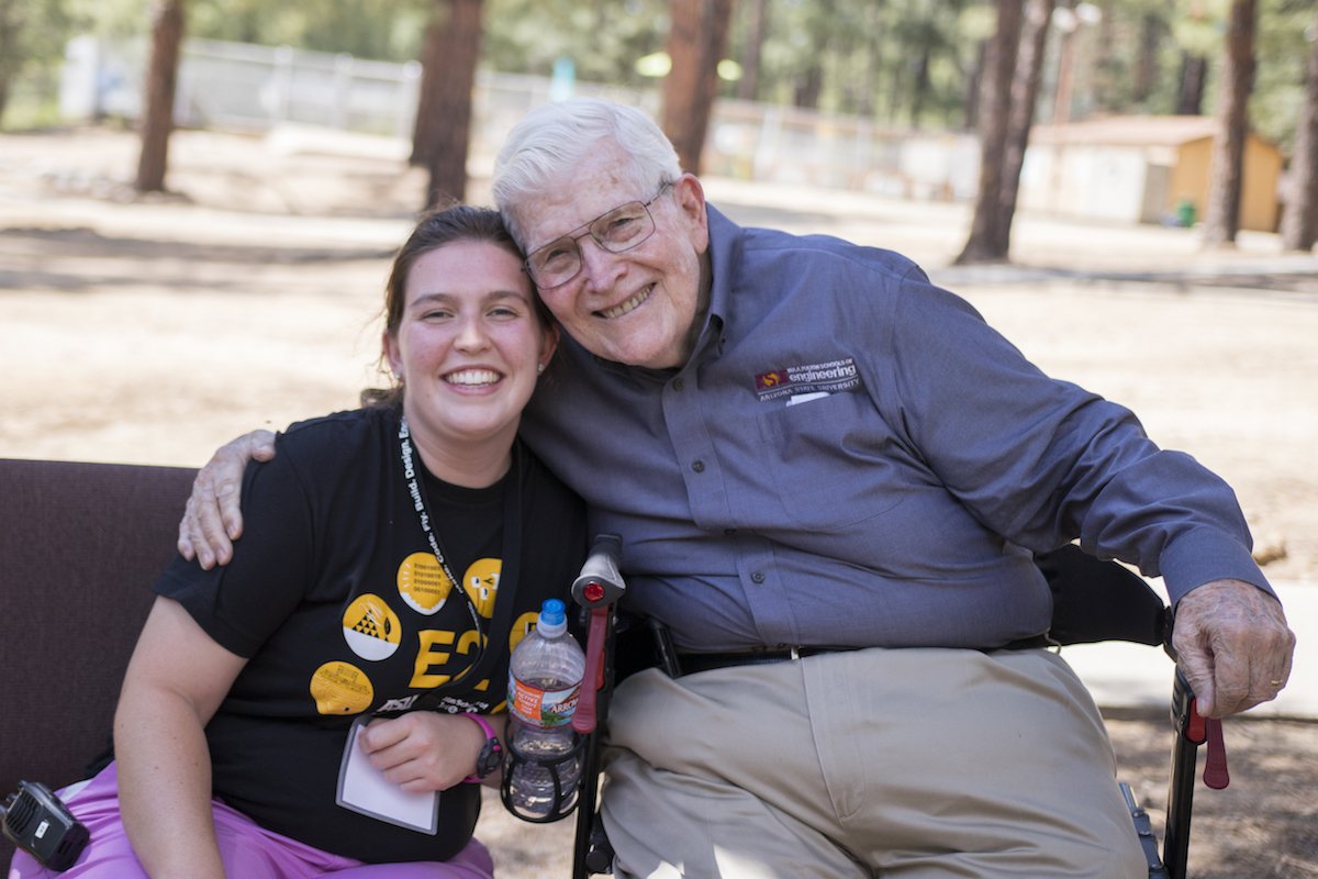 Emily Nugent with Ira A. Fulton at an E2 camp in 2018.