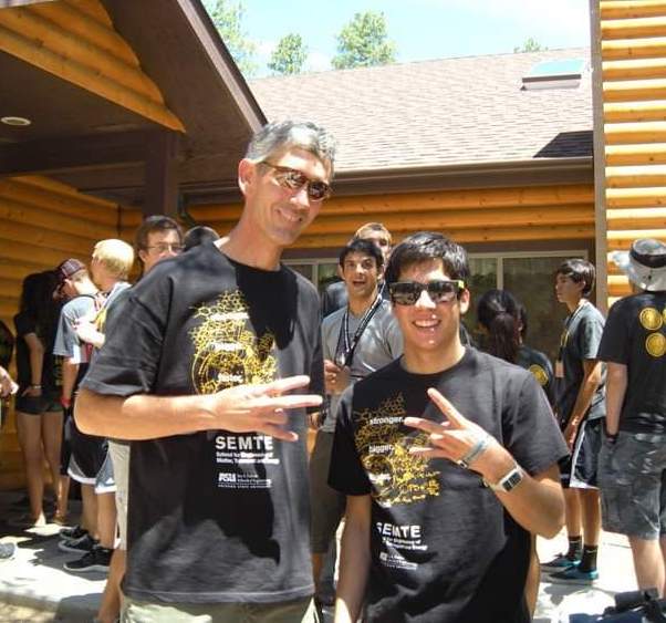 Former Fulton Schools Dean Paul Johnson and Nick Corrales at an E2 camp in 2012.