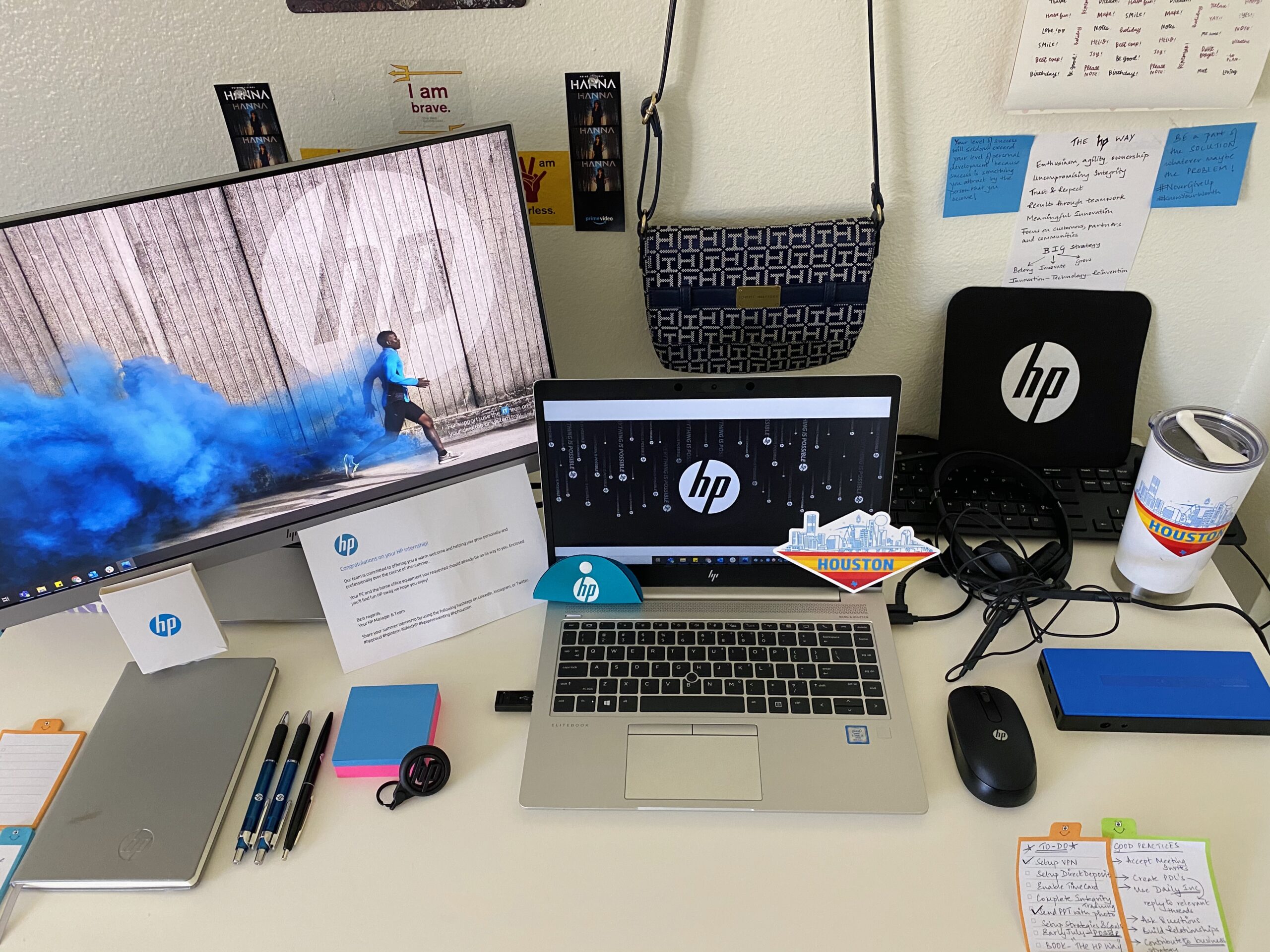 work desk with monitor and laptop computer