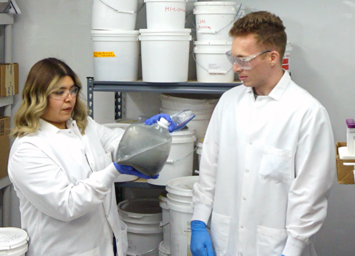 Aide Robles and Maxwell Silverman preparing samples in the lab 