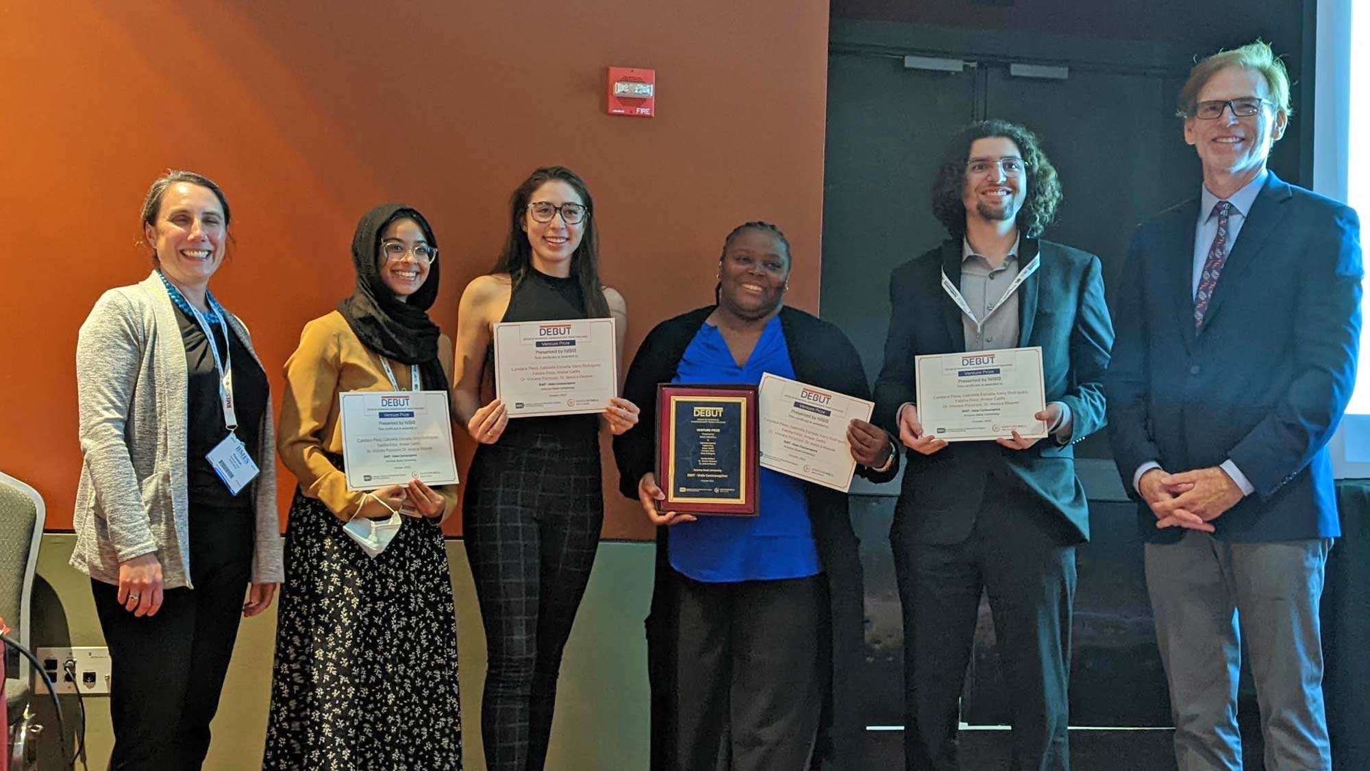 Members of EMIT team being recognized at BMES meeting