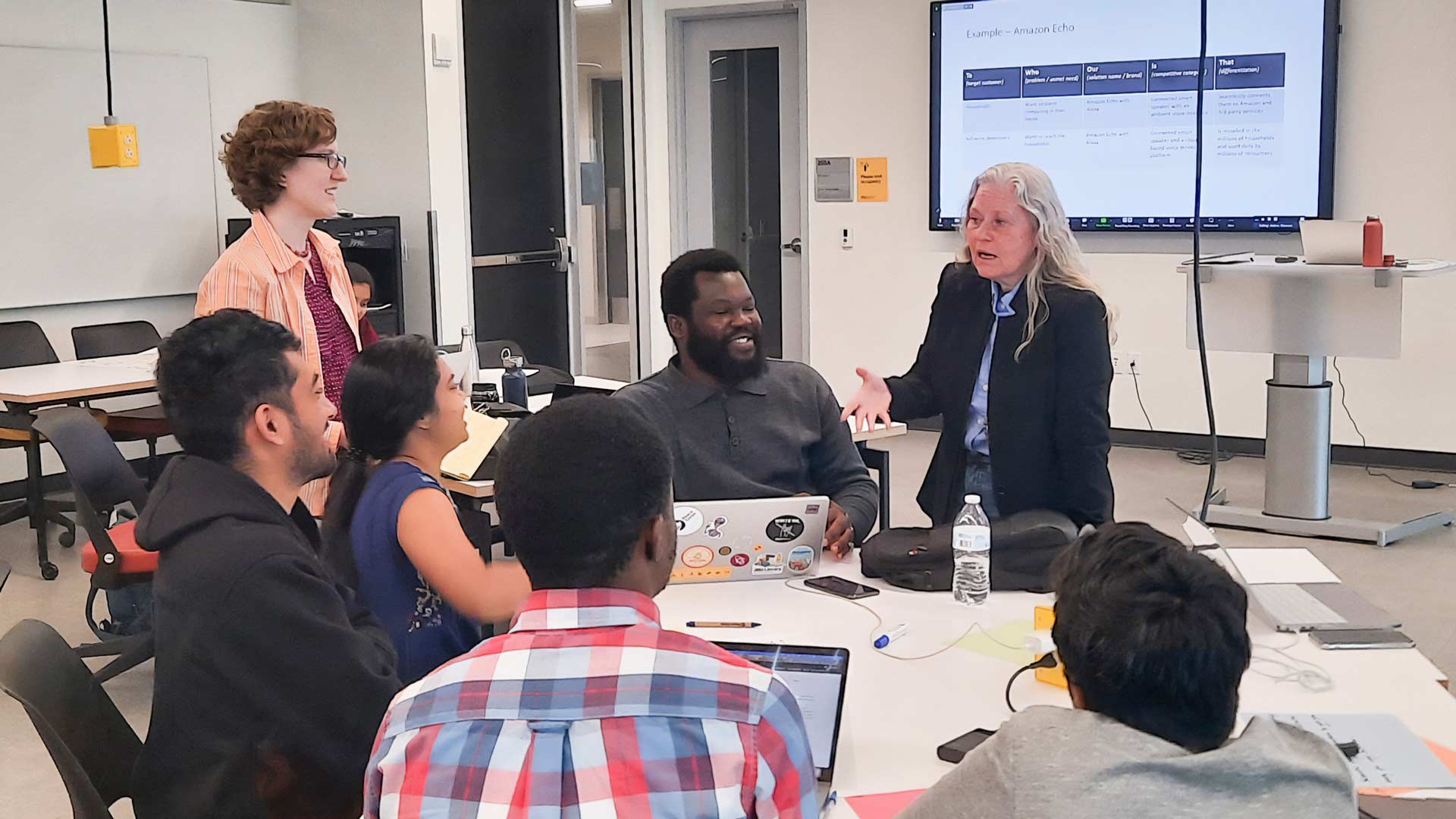 Andrea Cherman speaking to a group