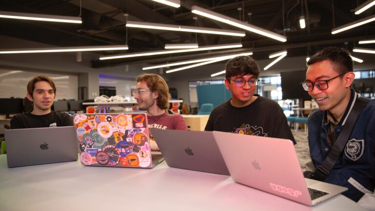 students working in Next Lab in the Creativity Common at ASU