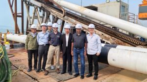 Jim Geisbush and Samuel Ariaratnam stand with the team from Sun Yat-sen University