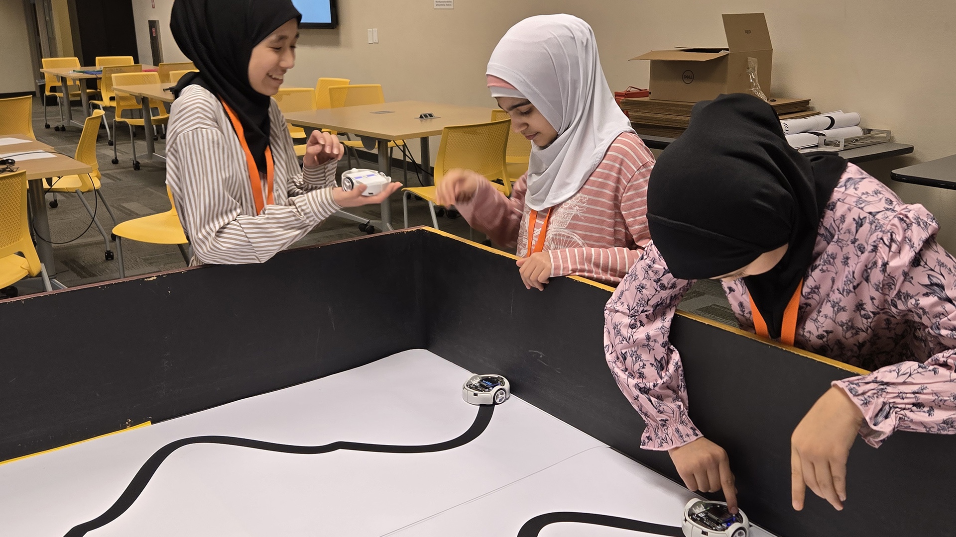 Middle school students test line-following robots